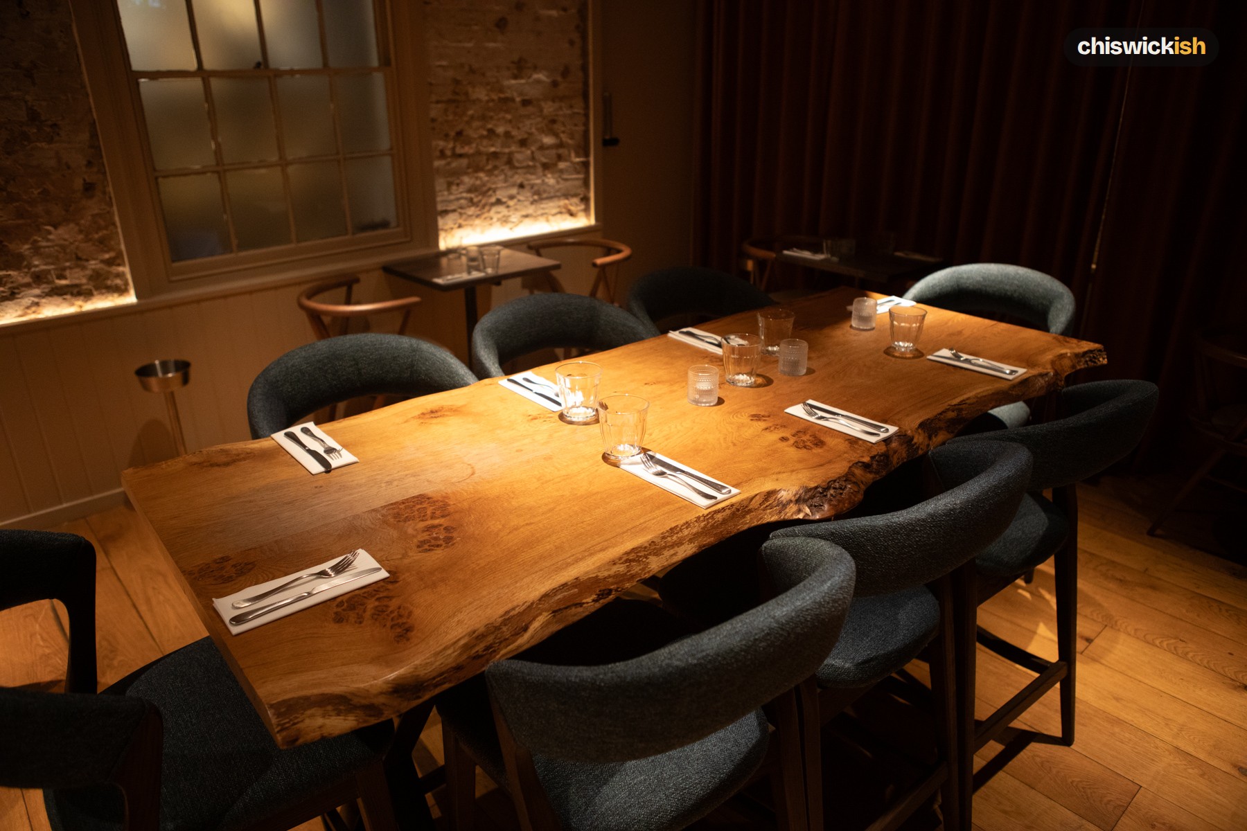 Loved the live-edge oak table in the wine room