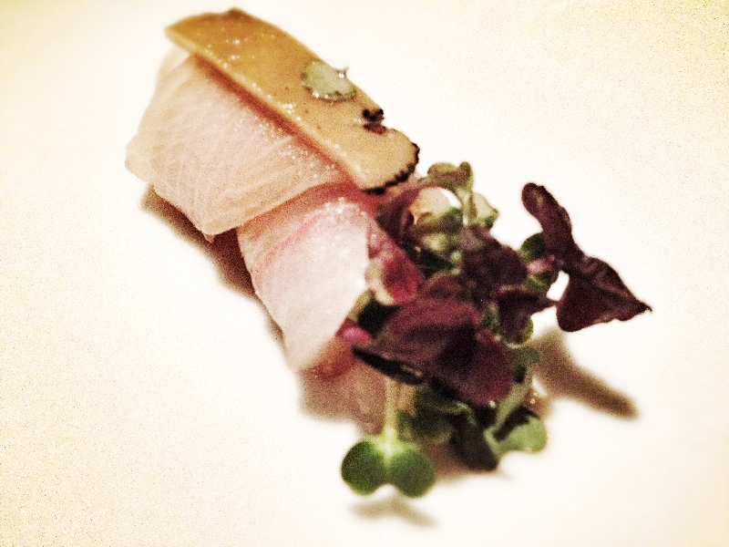 Yellowtail sashimi in black truffle-infused soy
