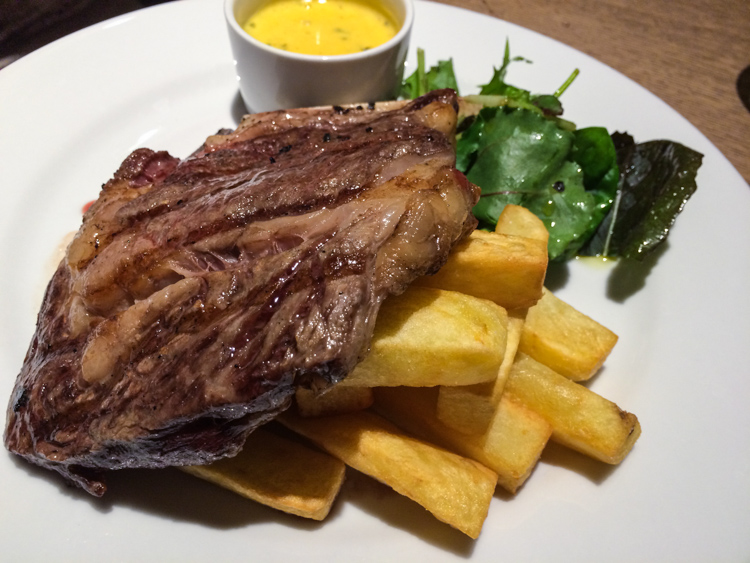 Chargrilled 10 oz Rib-eye Steak, Chunky Chips and Salad with Béarnaise