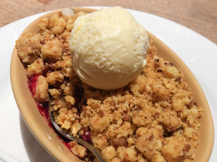Sticky fruit compote under a buttery crumble